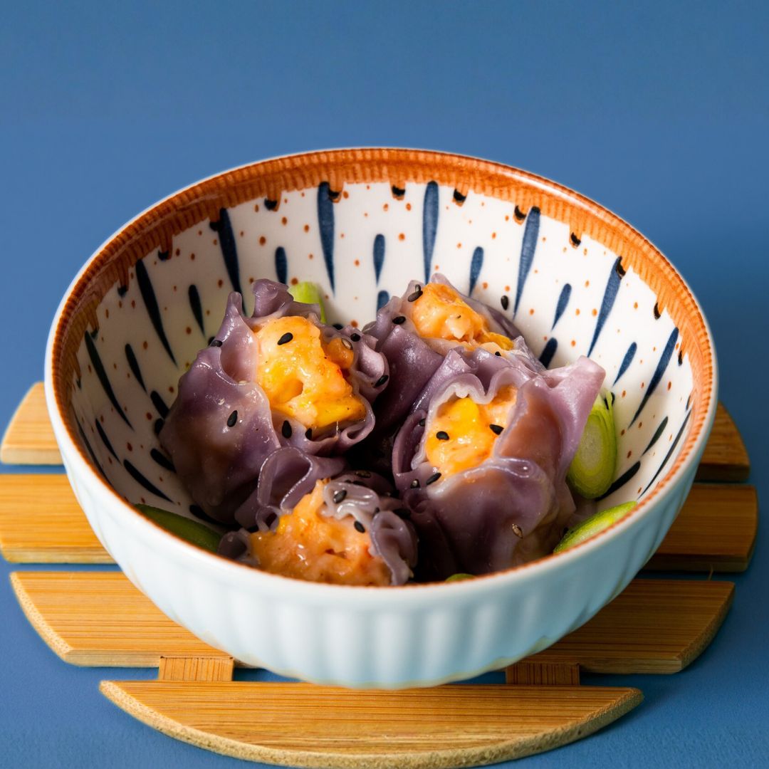 Prawn and sweetcorn siu mai dumplings served in a bowl from the Ding Dong Dim Sum pescatarian selection